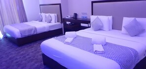 Habitación familiar | Sábanas de algodón egipcio y ropa de cama de alta calidad