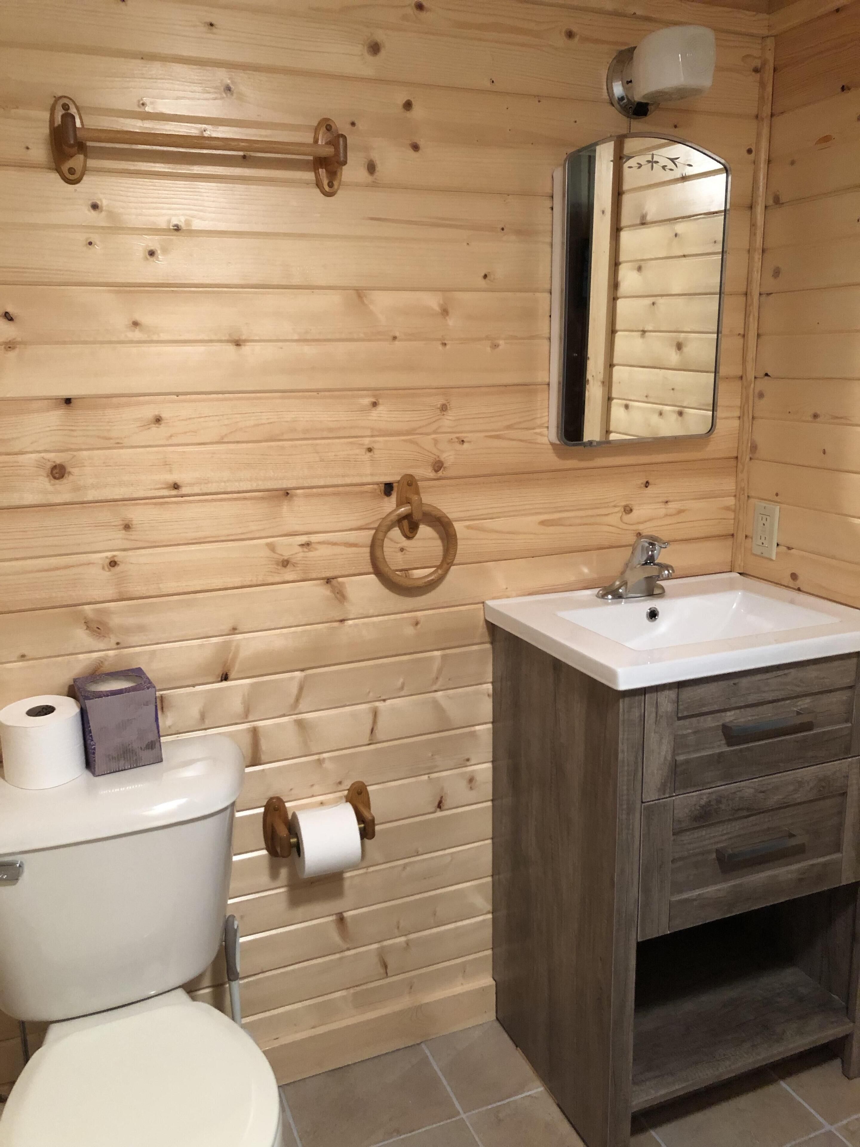 Shower, towels, soap, toilet paper