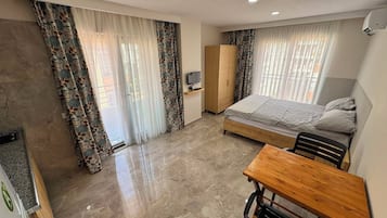 Basic Studio, City View | 1 bedroom, premium bedding, desk, laptop workspace