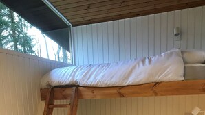 A bunk bed with a wooden ladder, white bedding, and a teal throw blanket. - SKERRY is an authentic log cabin in a lovely forest location close to Loch Awe (Taynuilt)