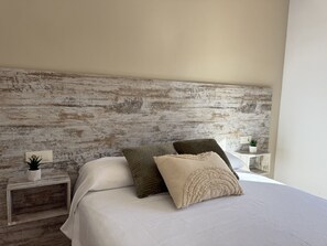 2 dormitorios, tabla de planchar con plancha, wifi gratis y ropa de cama