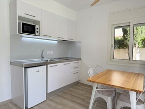 Fridge, microwave, coffee/tea maker, toaster