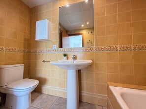 Bañera y toallas