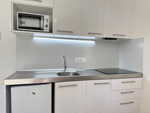 Fridge, microwave, coffee/tea maker, toaster