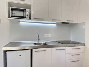 Fridge, microwave, coffee/tea maker, toaster