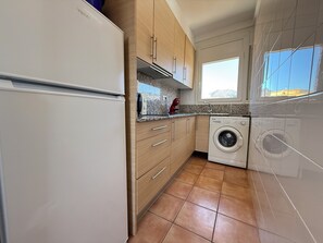Fridge, microwave, coffee/tea maker, toaster