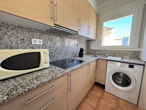 Fridge, microwave, coffee/tea maker, toaster