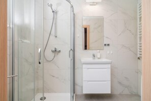 Shower, free toiletries, hair dryer, towels