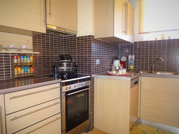 Apartment | Private kitchen | Full-size fridge, microwave, oven, stovetop