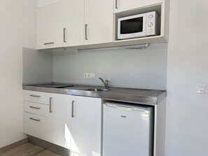 Fridge, microwave, coffee/tea maker, toaster