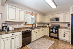 Fridge, microwave, oven, stovetop - Pet-Friendly Riverfront Home w/ Deck (Bend)