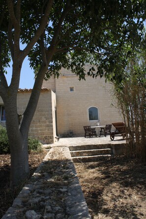 Outdoor dining - stone tower house (Ragusa)