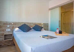1 quarto, Wi-Fi de cortesia, roupa de cama