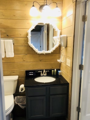 Hair dryer, towels, soap, shampoo -  Knotty Squirrel Unit 2 King Suite with Ladder Loft (Mountain View)