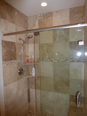 Combined shower/tub, hair dryer, towels, soap