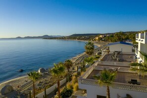 On the beach, sun loungers, beach towels