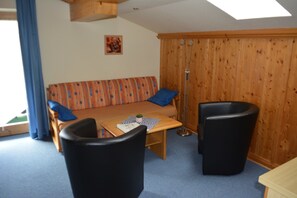 Apartment, 1 Queen Bed with Sofa bed, Balcony, Mountain View | Living area | Flat-screen TV - Chalet Tirol (Waidring)