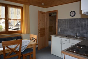 Family Apartment, 1 Queen Bed with Sofa bed, Balcony, Mountain View | Private kitchen | Coffee/tea maker, electric kettle