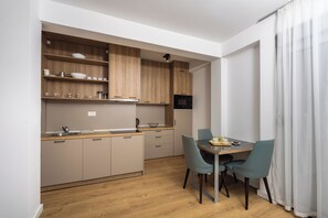 Fridge, microwave, electric kettle, high chair