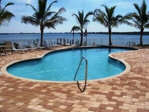 Outdoor pool, a heated pool - Boca Ciega Waterfront Condo, pool/hot tub, near Trails/Dining, 3mi Madeira Beach (St. Petersburg)