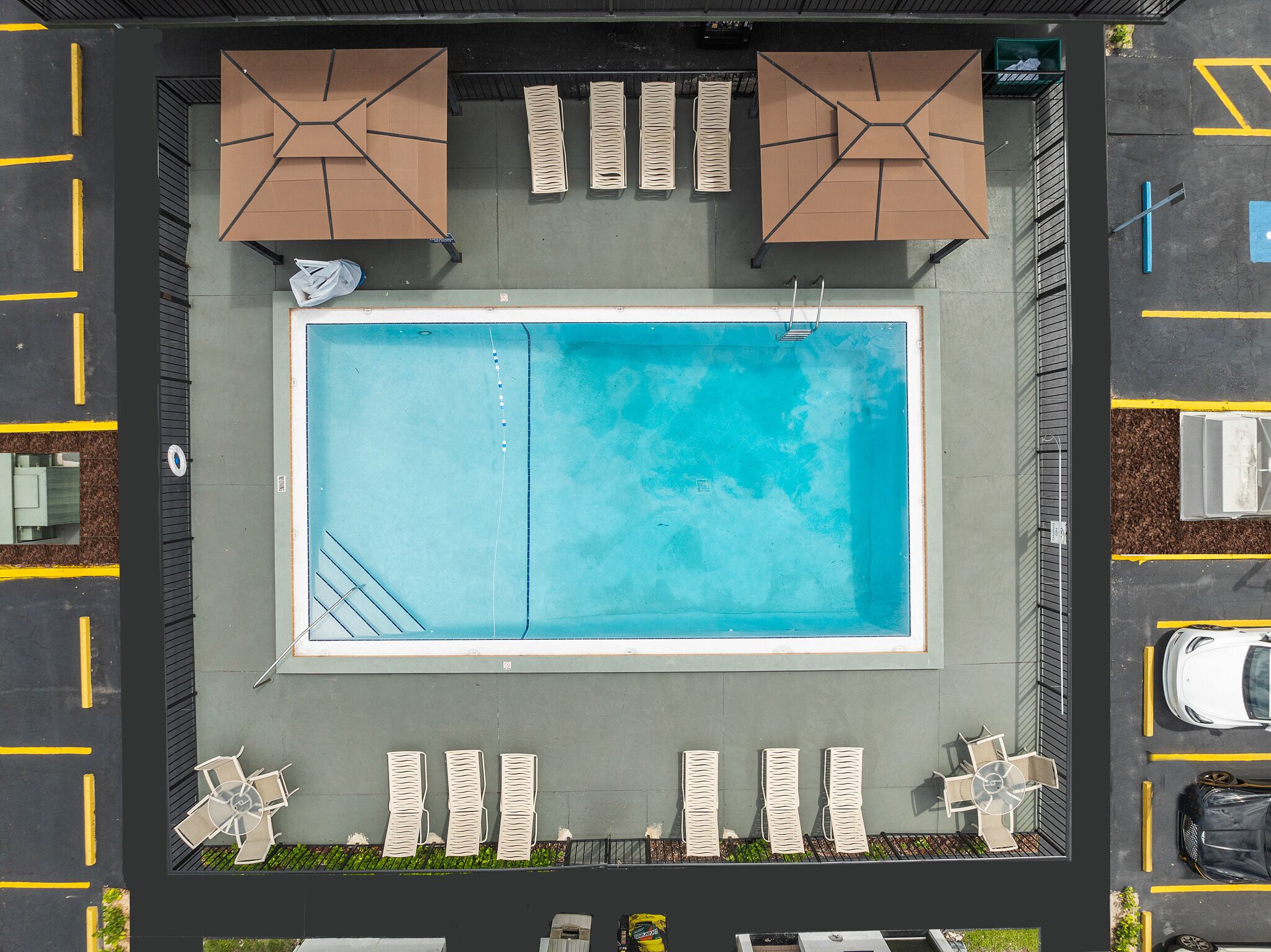 Outdoor pool, open 8:00 AM to 7:00 PM, pool umbrellas, sun loungers