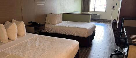 Ropa de cama de alta calidad, colchones con pillow-top y escritorio