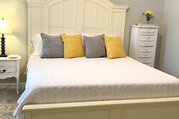 Cozy separate bedroom with TV