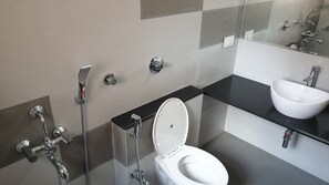 Shower, bidet, towels, soap