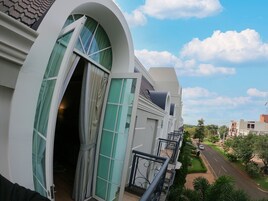 Premium Room, 1 King Bed, City View | Minibar, in-room safe, laptop workspace, iron/ironing board