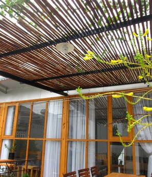 Family Room | Premium bedding, desk, blackout drapes, iron/ironing board - Chi Homestay (Ho Chi Minh City)