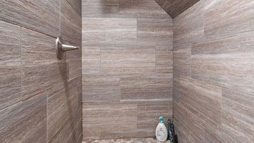 Combined shower/tub, hair dryer, towels, soap