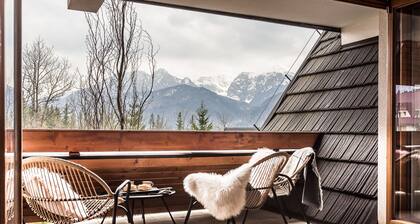 Beautiful apartment, fireplace, 2 verandas with mountain view and playground