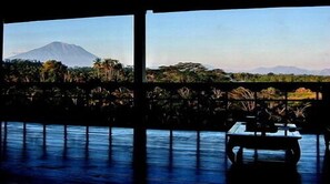 Enjoy breathtaking views of the surrounding landscape from the large window in this room.