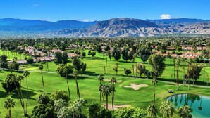 A golf course with a view of mountains in the background. - Luxury Palm Desert Mid-Century Home Private Pool Golf Course (Palm Desert)