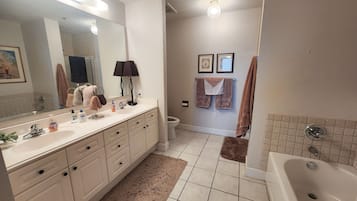 Combined shower/tub, hair dryer, towels, soap