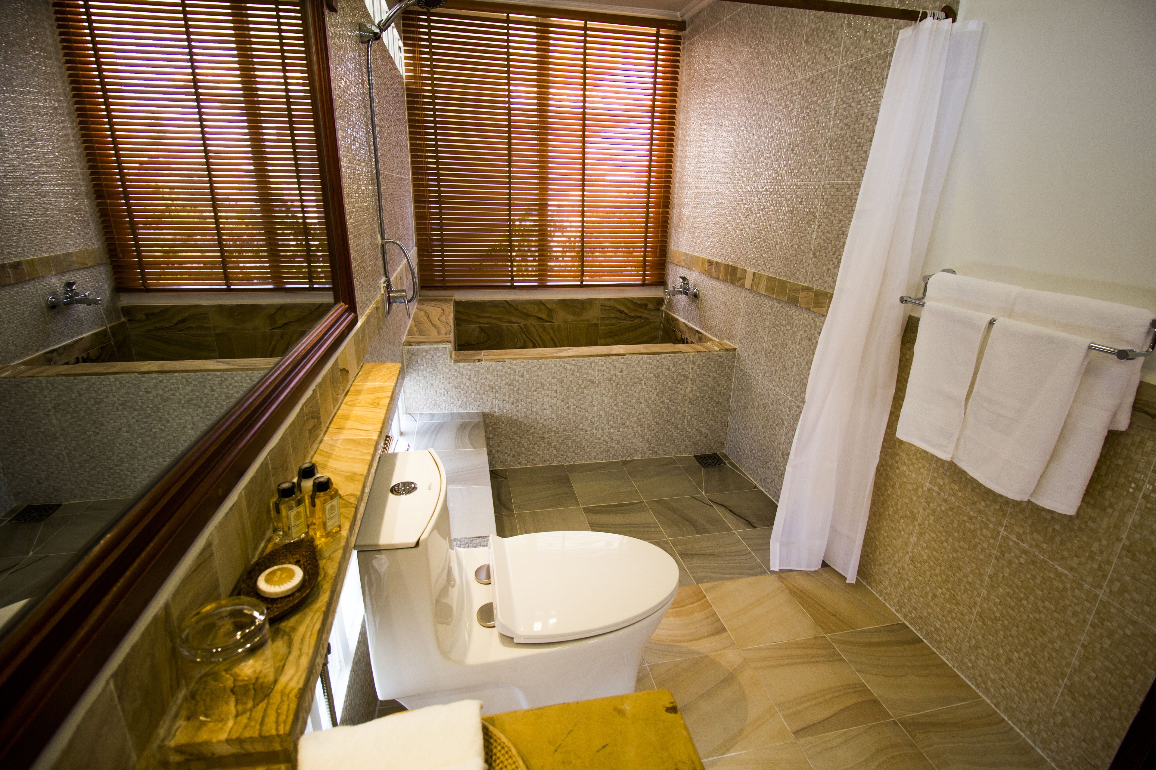 Superior Room | Bathroom | Hair dryer, slippers, bidet, towels