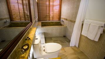 Superior Room | Bathroom | Hair dryer, slippers, bidet, towels