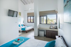 Family Room, Multiple Beds, City View | Minibar, in-room safe, blackout drapes, iron/ironing board - At Ease Beach Hotel (Hikkaduwa)