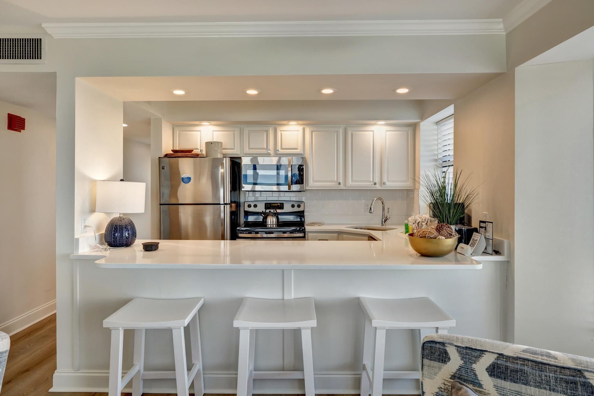 Fridge, microwave, coffee/tea maker, high chair