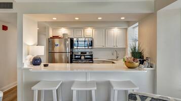 Fridge, microwave, coffee/tea maker, high chair