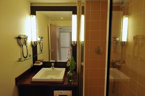 Shower, hair dryer, towels, toilet paper