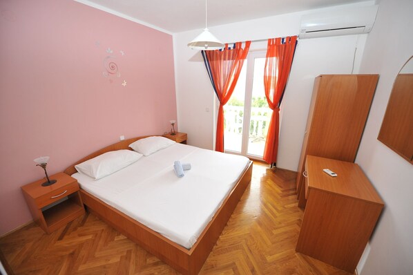 2 dormitorios, tabla de planchar con plancha, wifi y ropa de cama