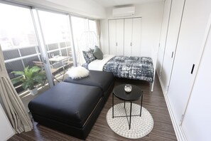 Deluxe Apartment, Multiple Beds, City View | Down comforters, blackout drapes, free WiFi - designer penthouse NANBA EAST (Osaka)