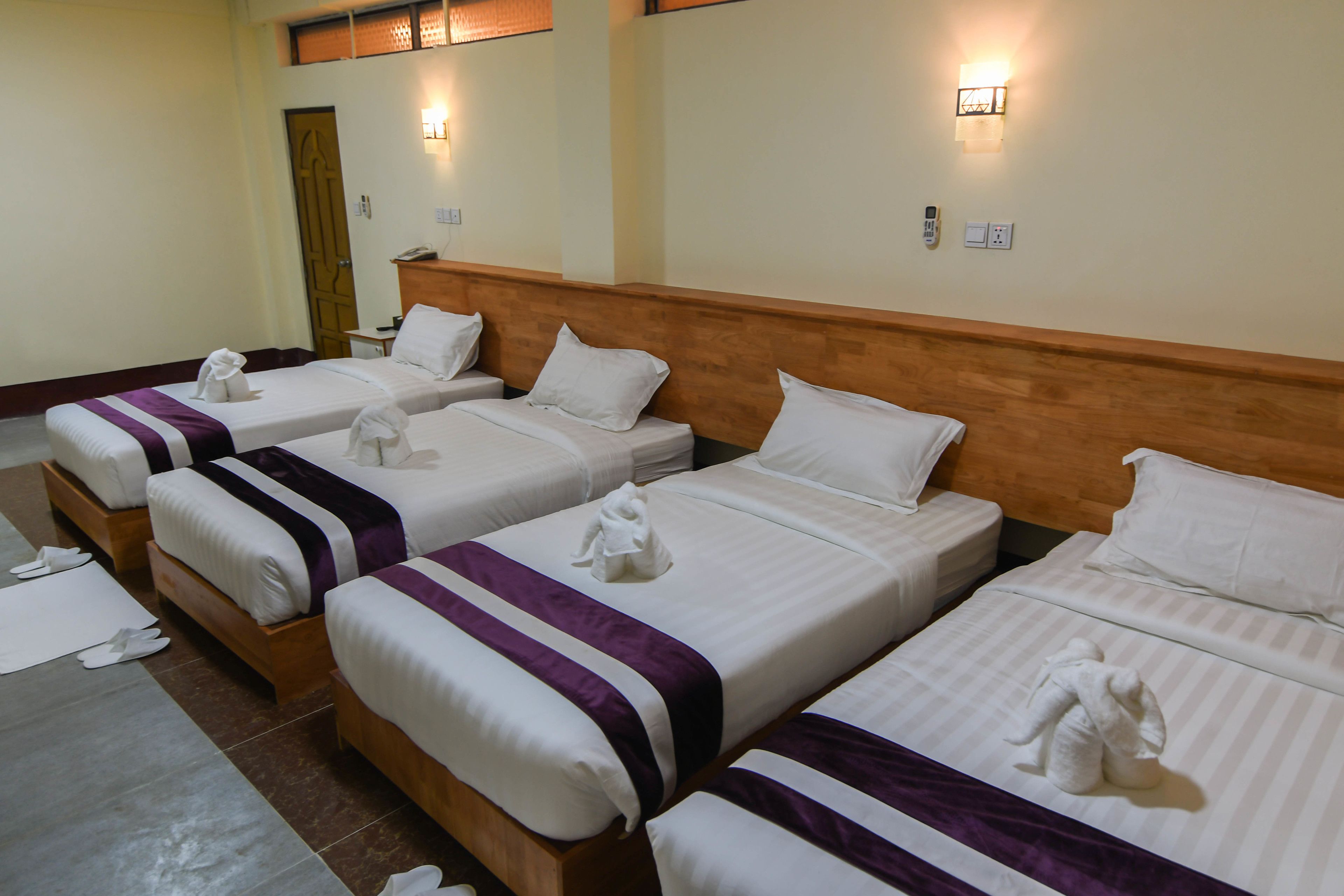 Family Room, Multiple Beds | Living area | Flat-screen TV
