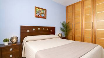 2 dormitorios, tabla de planchar con plancha, wifi gratis y ropa de cama