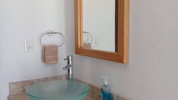 Shower, towels, soap, toilet paper