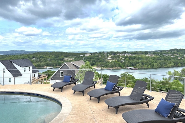 The pool is 8 feet deep at one end and has steps for easy entry and exit.