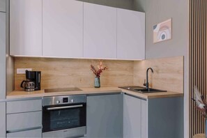 Réfrigérateur, four, plaque de cuisson, lave-vaisselle