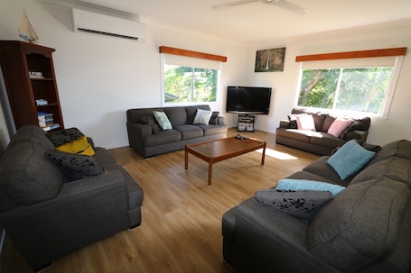 TV, DVD player, video library. Forrest Beach Getaway - family holiday haven