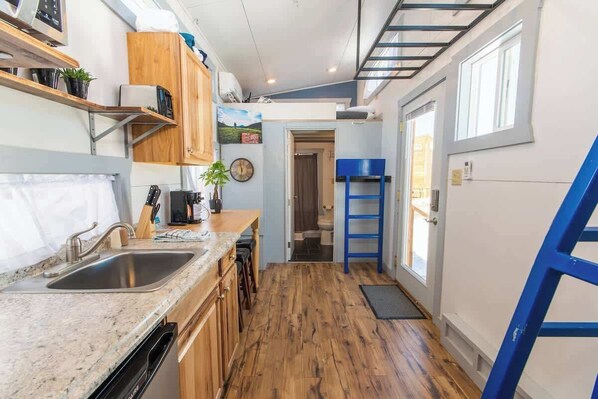 Fridge, microwave, stovetop, coffee/tea maker